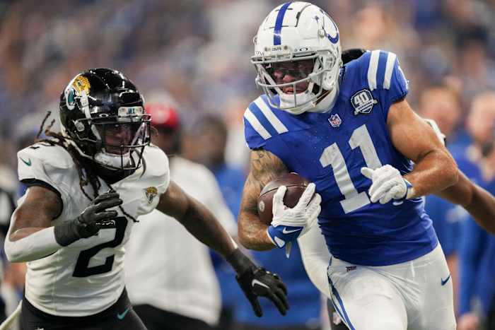 Jacksonville Jaguars safety Rayshawn Jenkins (2) chases after Indianapolis Colts wide receiver Michael Pittman Jr. (11) as he rushes in a touchdown Sunday, Sept. 10, 2023, during a game against the Jacksonville Jaguars at Lucas Oil Stadium in Indianapolis.